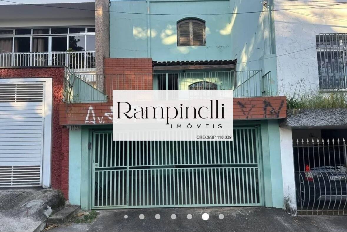VENDE CASA 2 DORMITÓRIOS COM TERRAÇO E 2 VAGAS NA VILA ROMANA